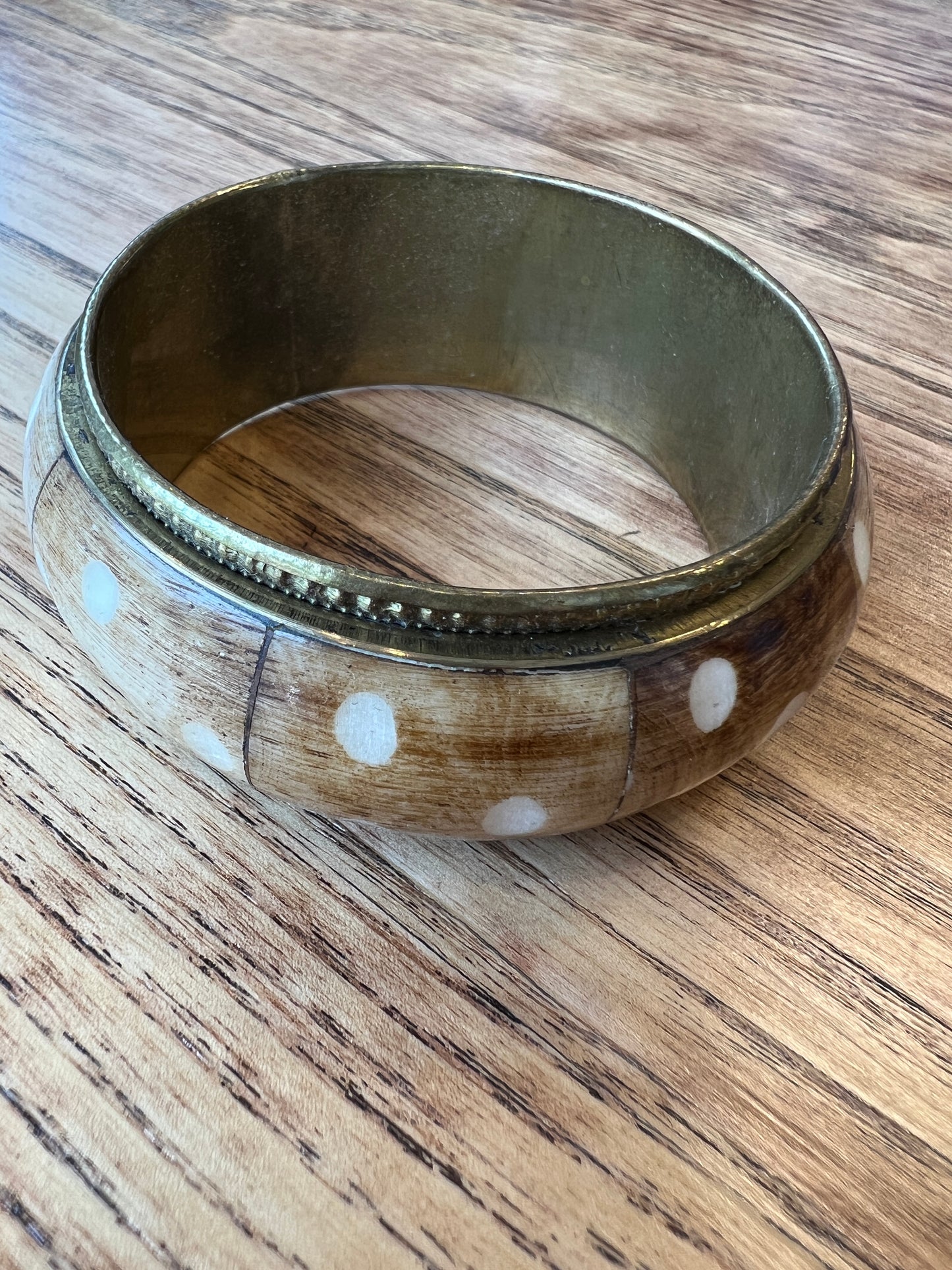 Gold and bone bangle