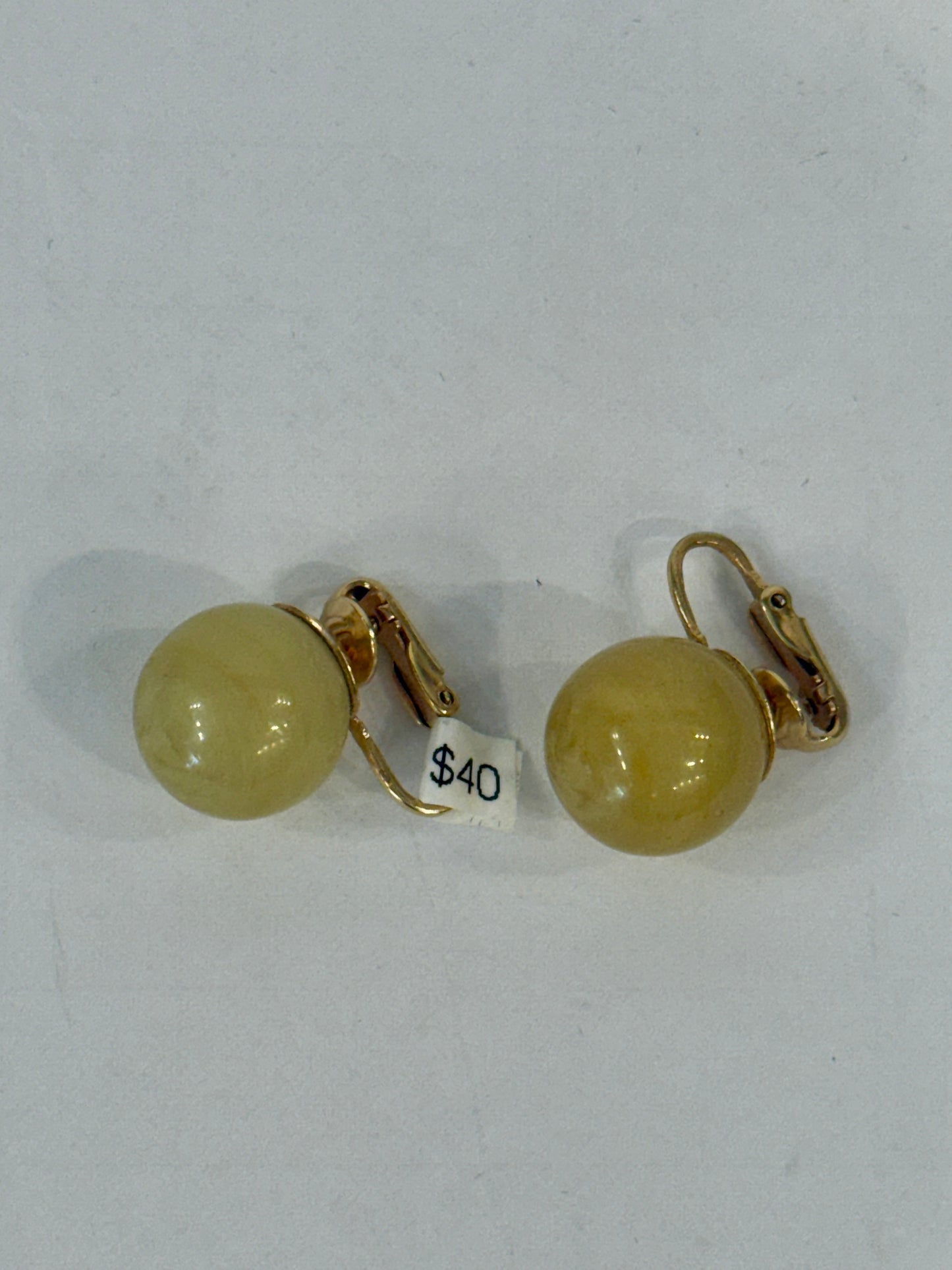 Round green and gold stone clip earrings