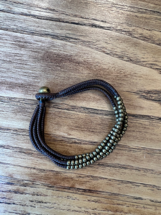 4 row bracelet with brass beads