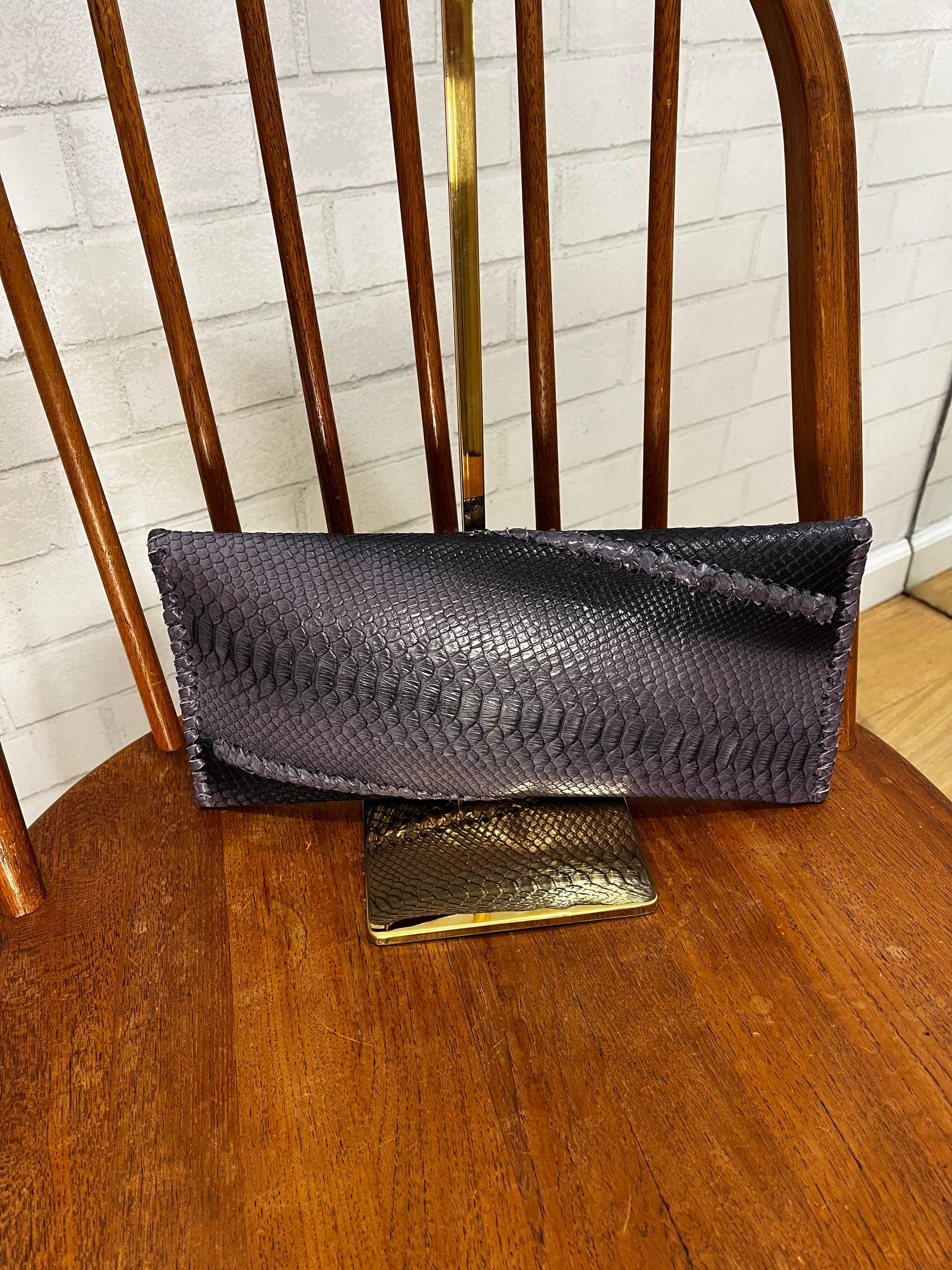 Carlos falchi clutch sale