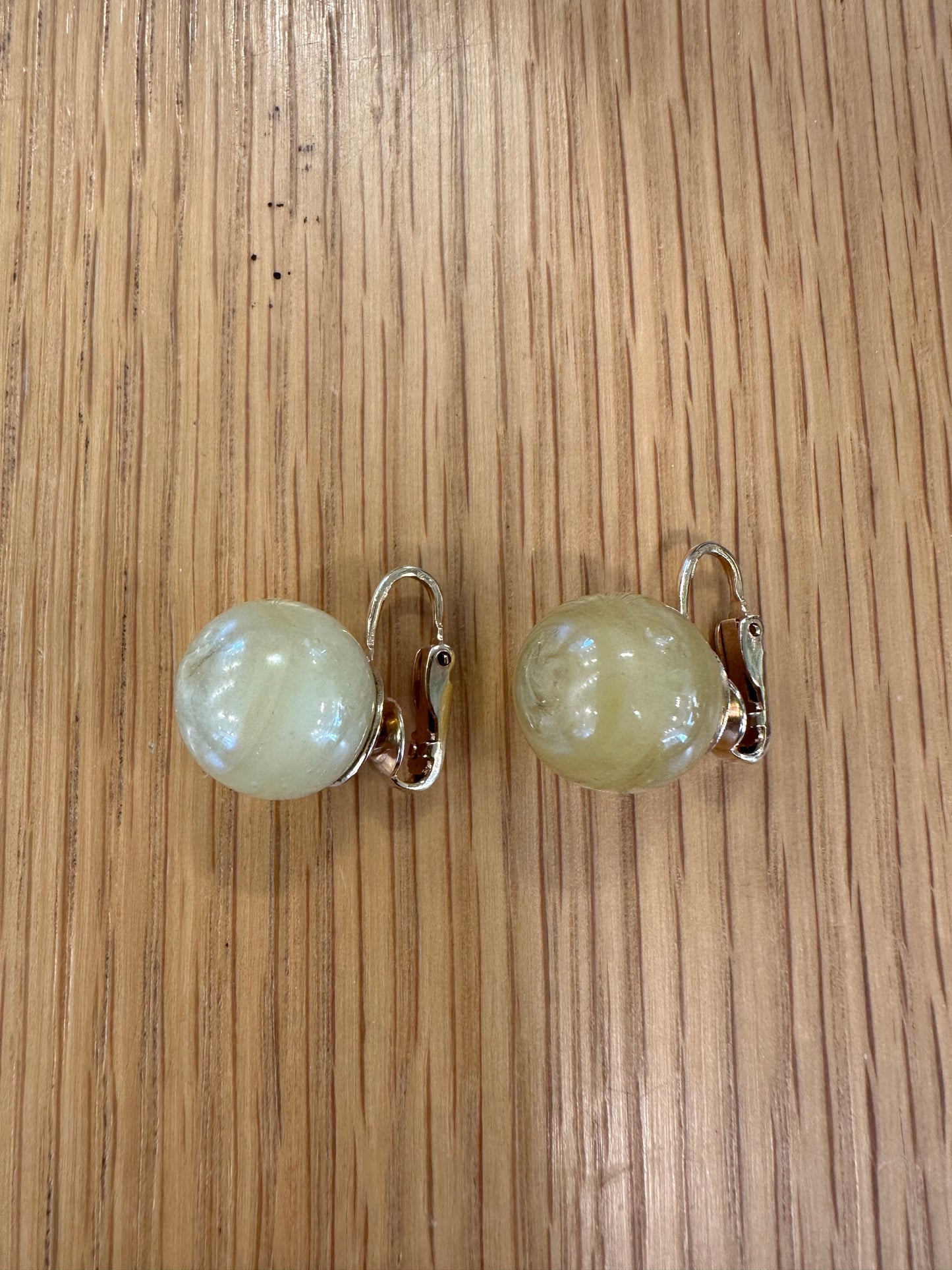 Round green and gold stone clip earrings