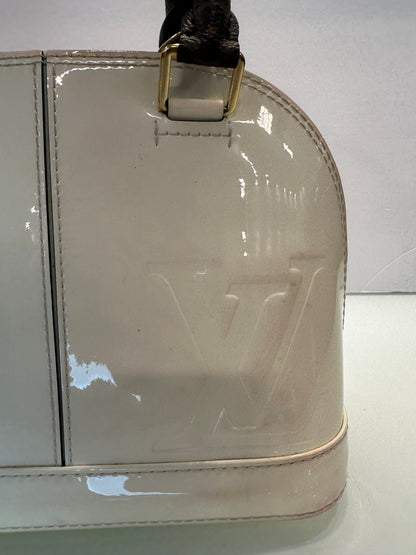 LOUIS VUITTON Vernis Miroir Alma with LV logo Strap
