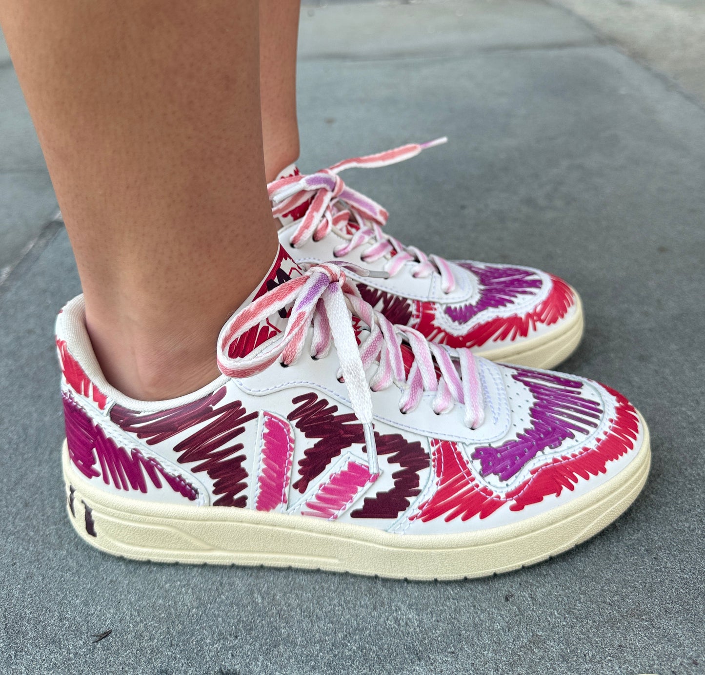 Veja x Marni V-10 scribble sneaker worn on foot side view street style