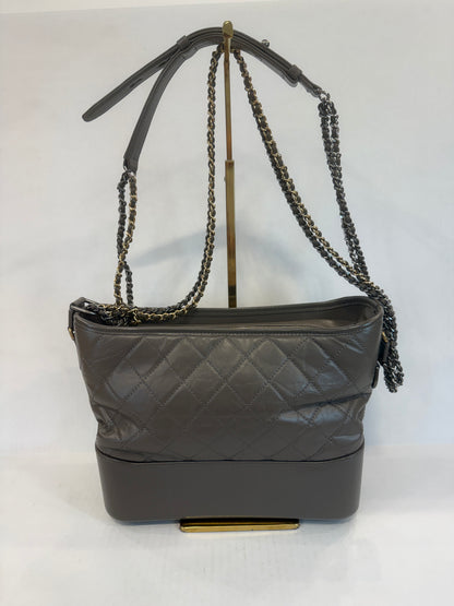 CHANEL Gabrielle Hobo Medium in Metallic Silver Aged Calfskin — Authentic Pre-Owned | Karl Lagerfeld 2017