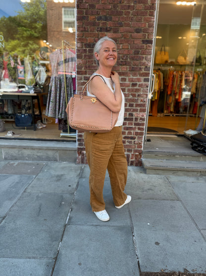 VALENTINO GARAVANI Rockstud Medium Tote with the front clasp closure — Blush