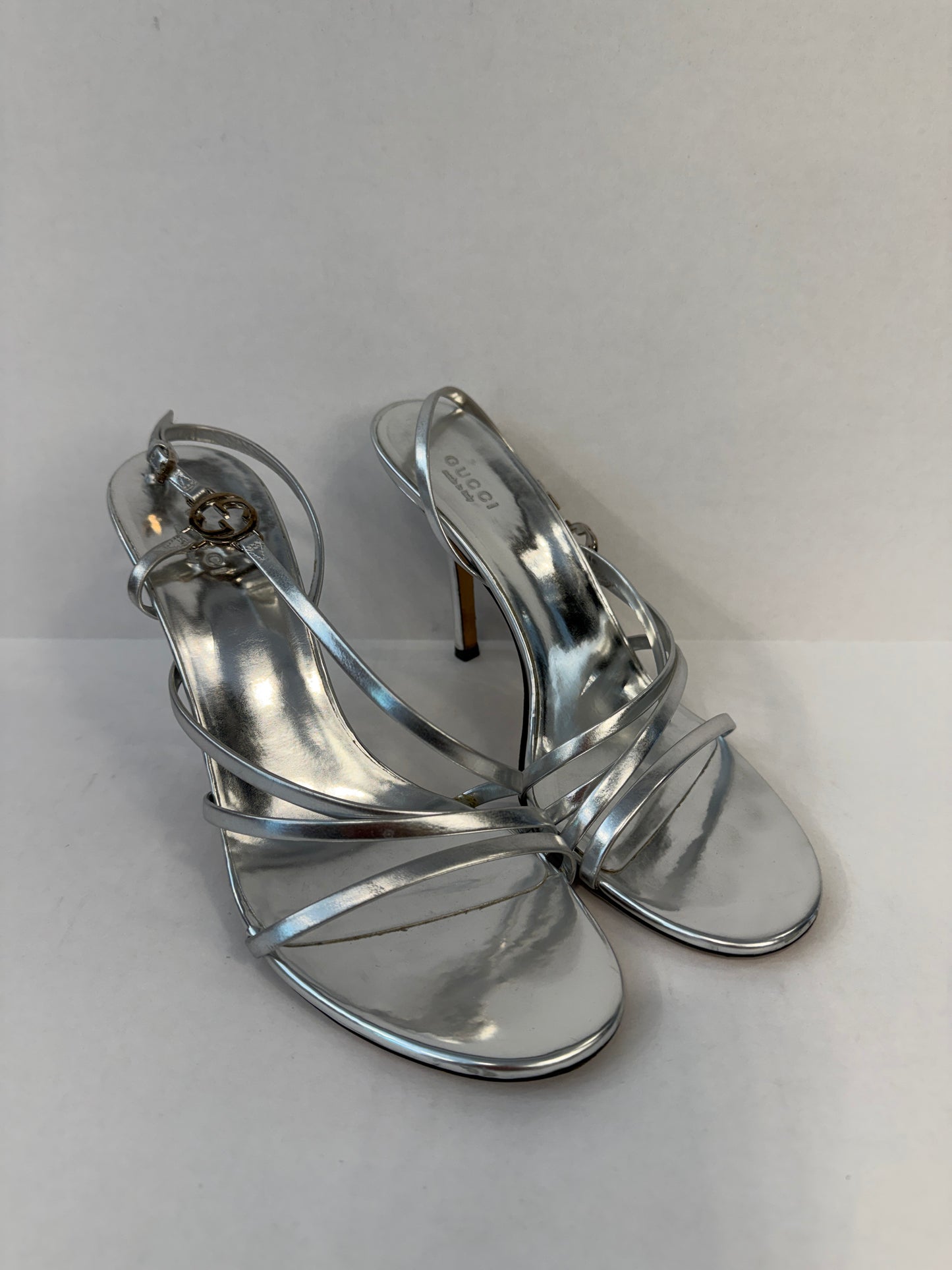 GUCCI Interlocking GG Strappy Stiletto Sandals in Silver Metallic Leather — Authentic Pre-Owned | US8-EU38.5