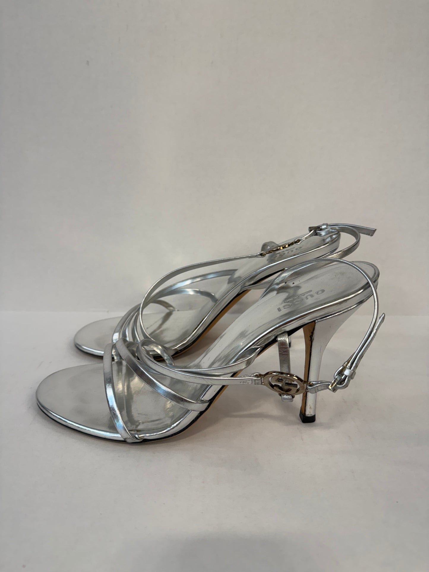 GUCCI Interlocking GG Strappy Stiletto Sandals in Silver Metallic Leather — Authentic Pre-Owned | US8-EU38.5