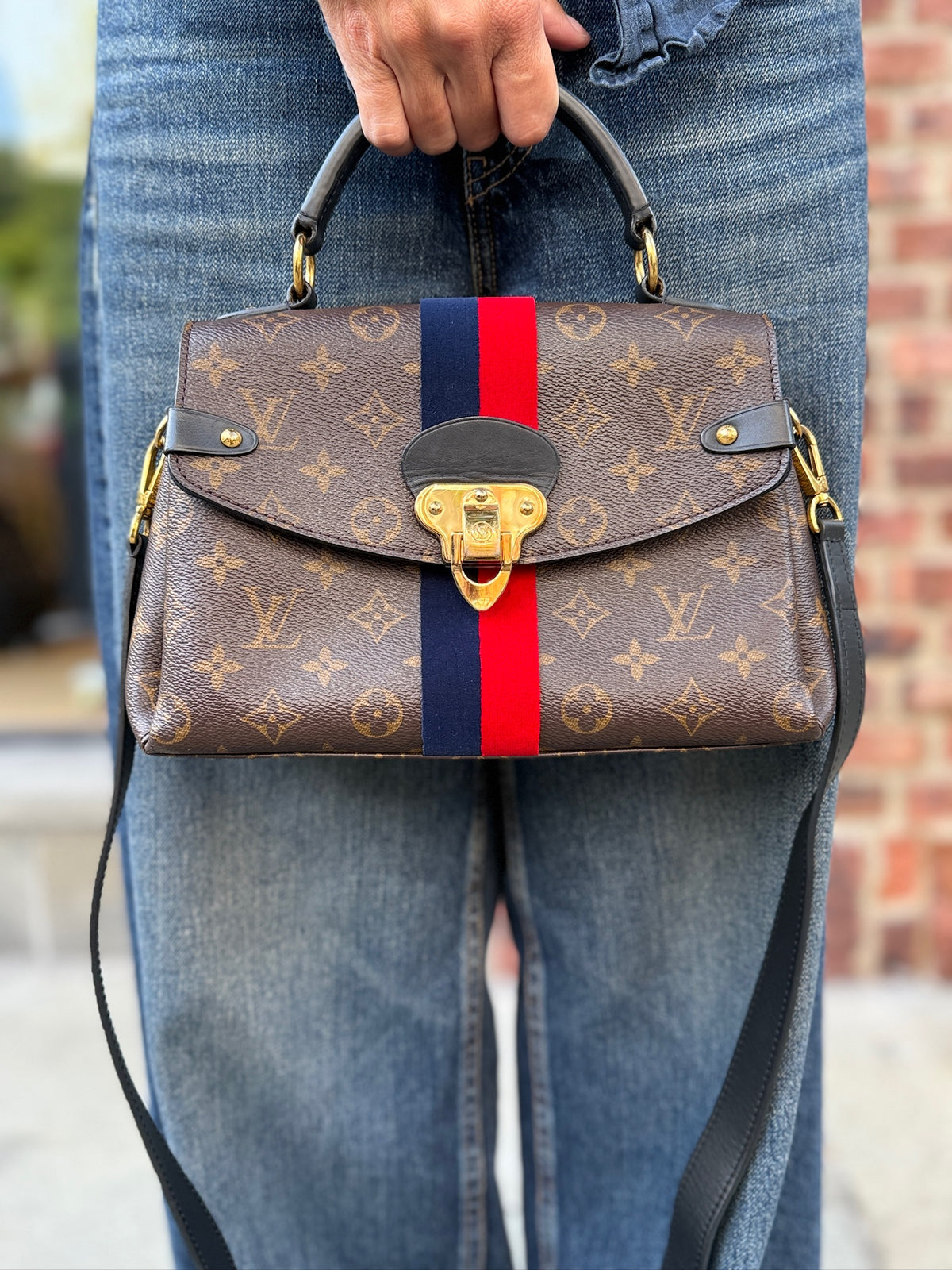 Louis Vuitton Georges BB Monogram top handle bag navy red velvet stripe front view gold hardware

